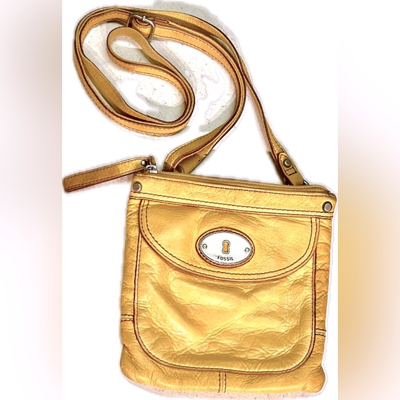Fossil Handbags - Fossil Yellow crossbody in used condition